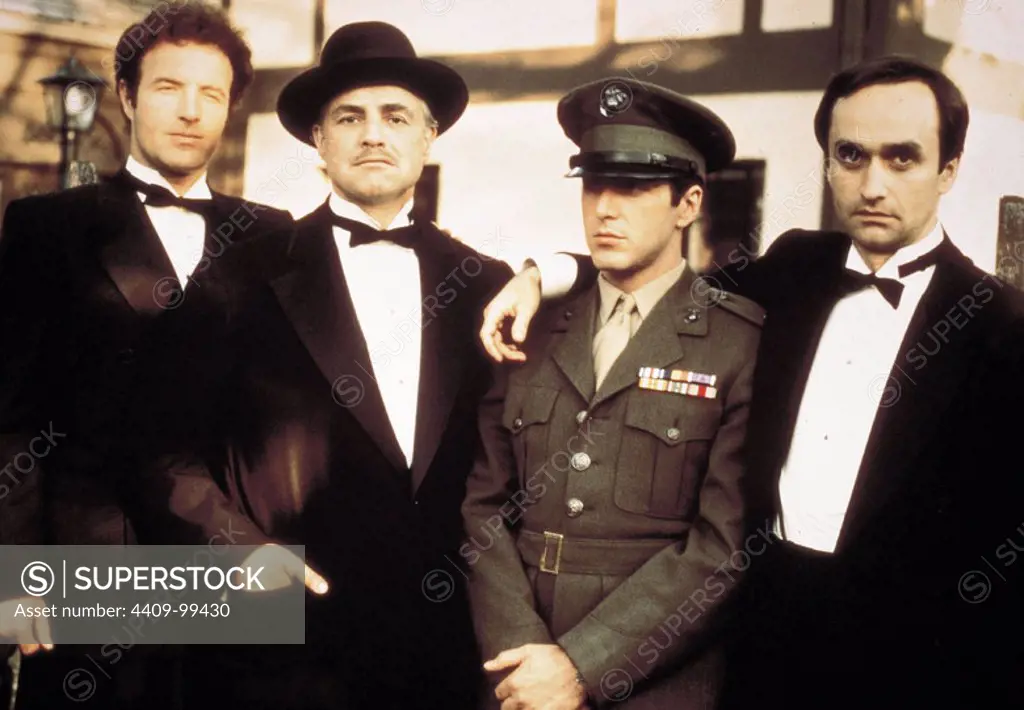 AL PACINO, JAMES CAAN, MARLON BRANDO and JOHN CAZALE in THE GODFATHER (1972), directed by FRANCIS FORD COPPOLA.