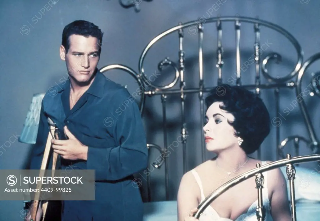 PAUL NEWMAN and ELIZABETH TAYLOR in CAT ON A HOT TIN ROOF (1958), directed by RICHARD BROOKS.