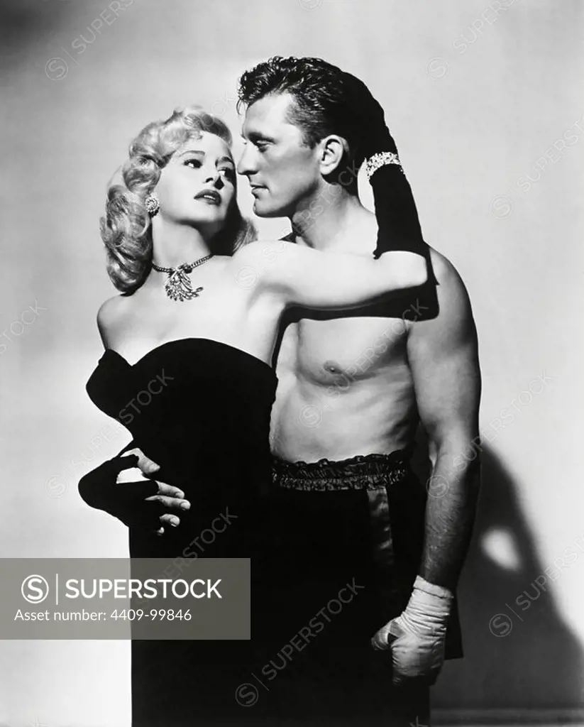 KIRK DOUGLAS and MARILYN MAXWELL in CHAMPION (1949), directed by MARK ROBSON.