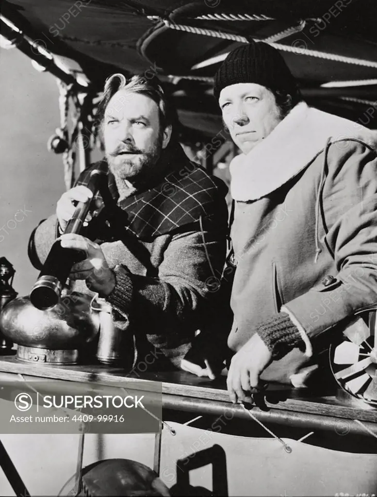 DAVID HARTMAN and DONALD SINDEN in THE ISLAND AT THE TOP OF THE WORLD (1974), directed by ROBERT STEVENSON.