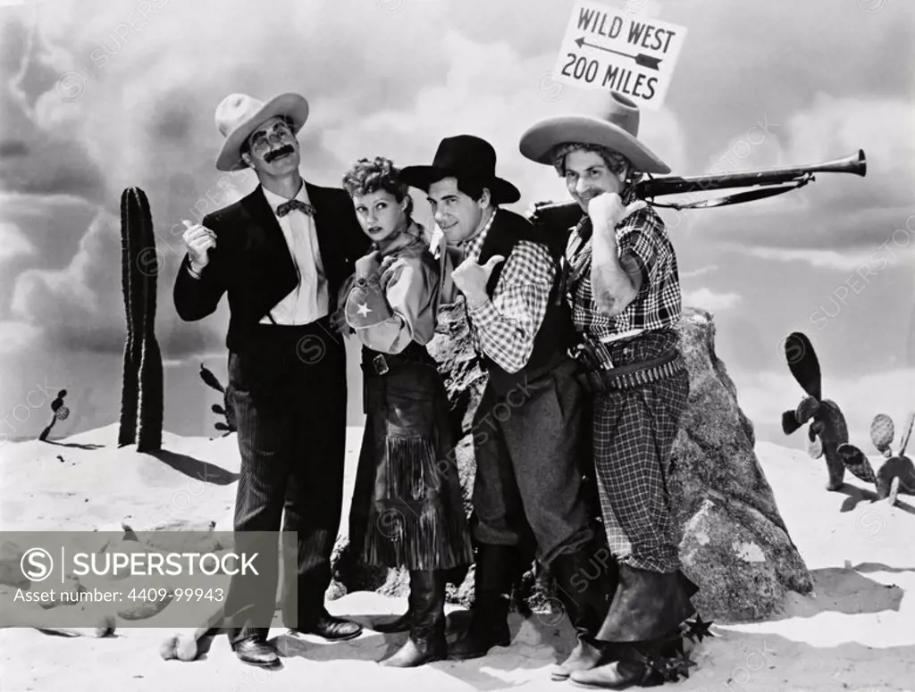 HARPO MARX, THE MARX BROTHERS, CHICO MARX, GROUCHO MARX and DIANA LEWIS in GO WEST (1940), directed by EDWARD BUZZELL.