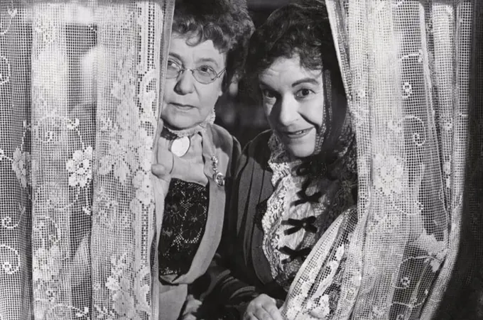 JOSEPHINE HULL and JEAN ADAIR in ARSENIC AND OLD LACE (1944), directed by FRANK CAPRA.