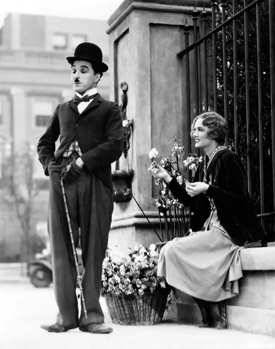 CHARLIE CHAPLIN and VIRGINIA CHERRILL in CITY LIGHTS (1931), directed by CHARLIE CHAPLIN.