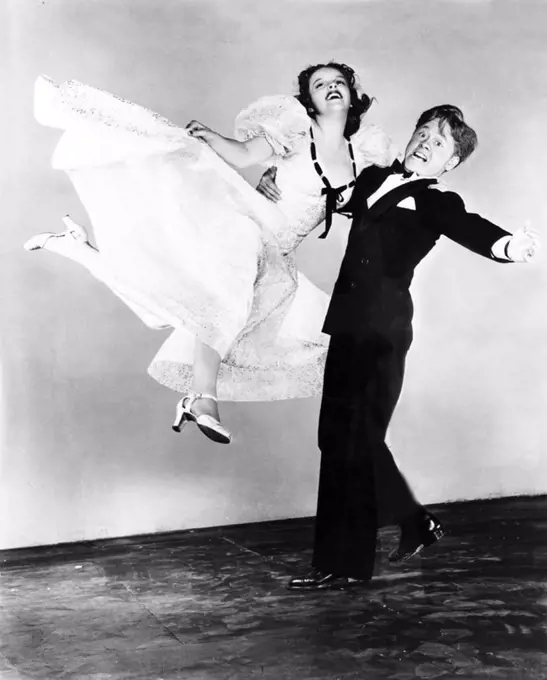 MICKEY ROONEY and JUDY GARLAND in STRIKE UP THE BAND (1940), directed by BUSBY BERKELEY.
