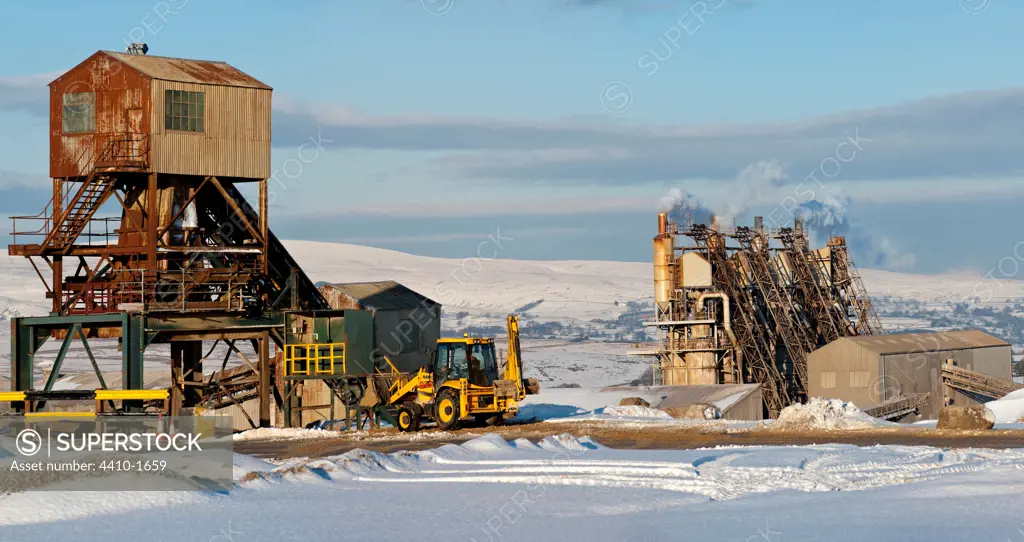 CEMEX Cement Works and limestone crushing plant with Lowther Valley and eastern Lake District behind, Shap Fell, Cumbria, England