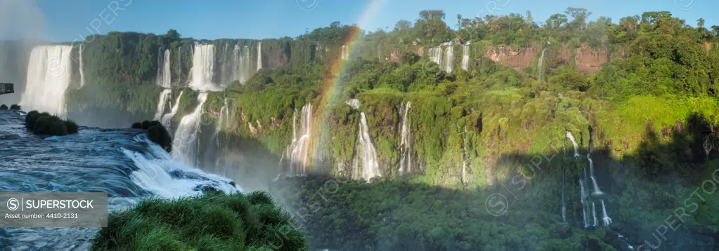 Brasil, State of Parana, Rainbow over Iguasu Falls on Iguasu River photographed from Brazilian side of Falls