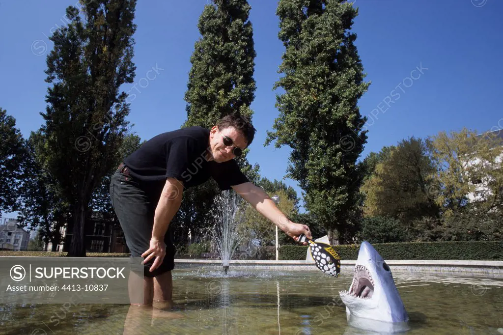 Daily feeding of a polyester pond shark