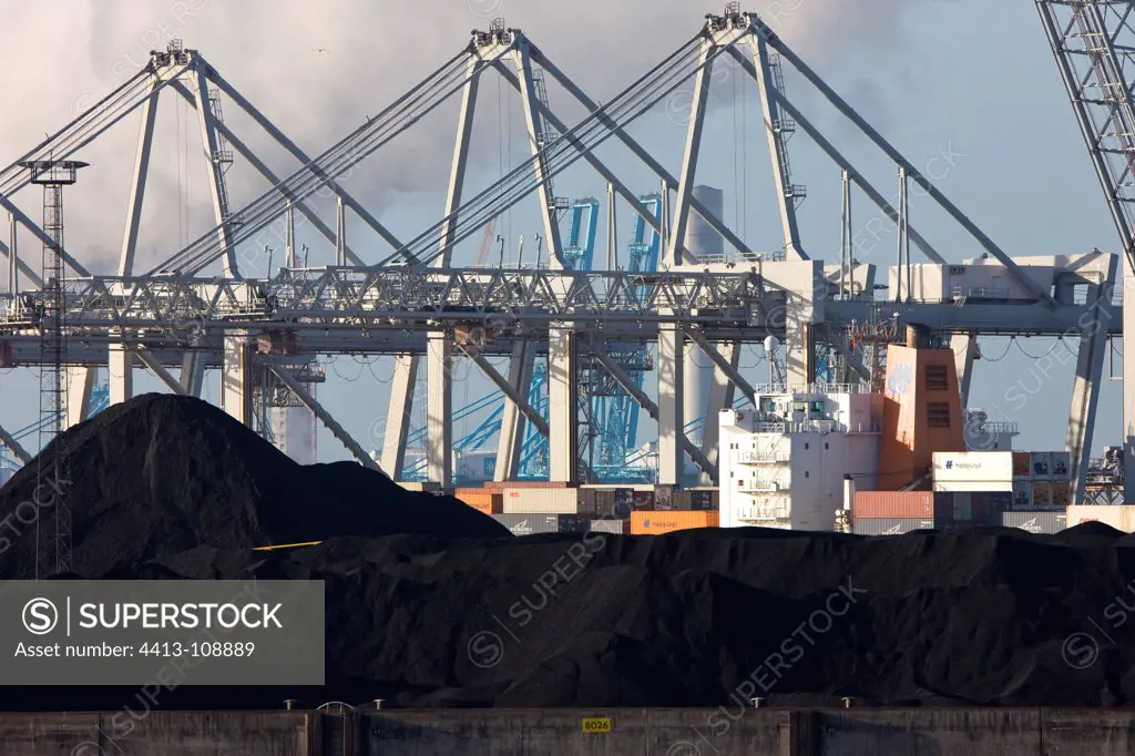 Piles of coal in the port of Rotterdam Netherlands