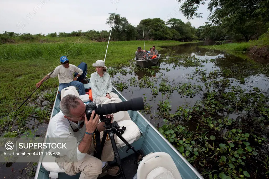 Watching Jaguars boat Encontros das Aguas Pantanal Brazil