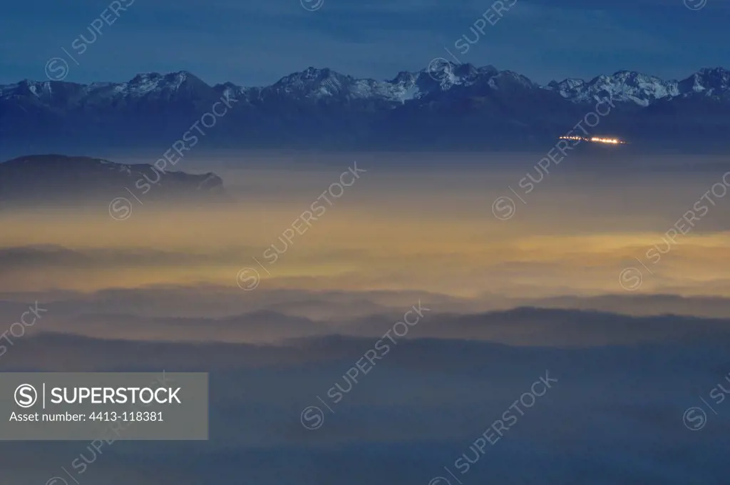 Sea of clouds in the moonlight above Chambéry France