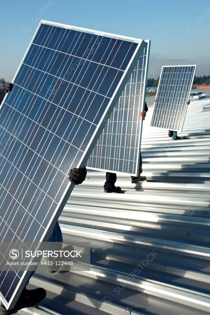 Installing solar panels on a roof France