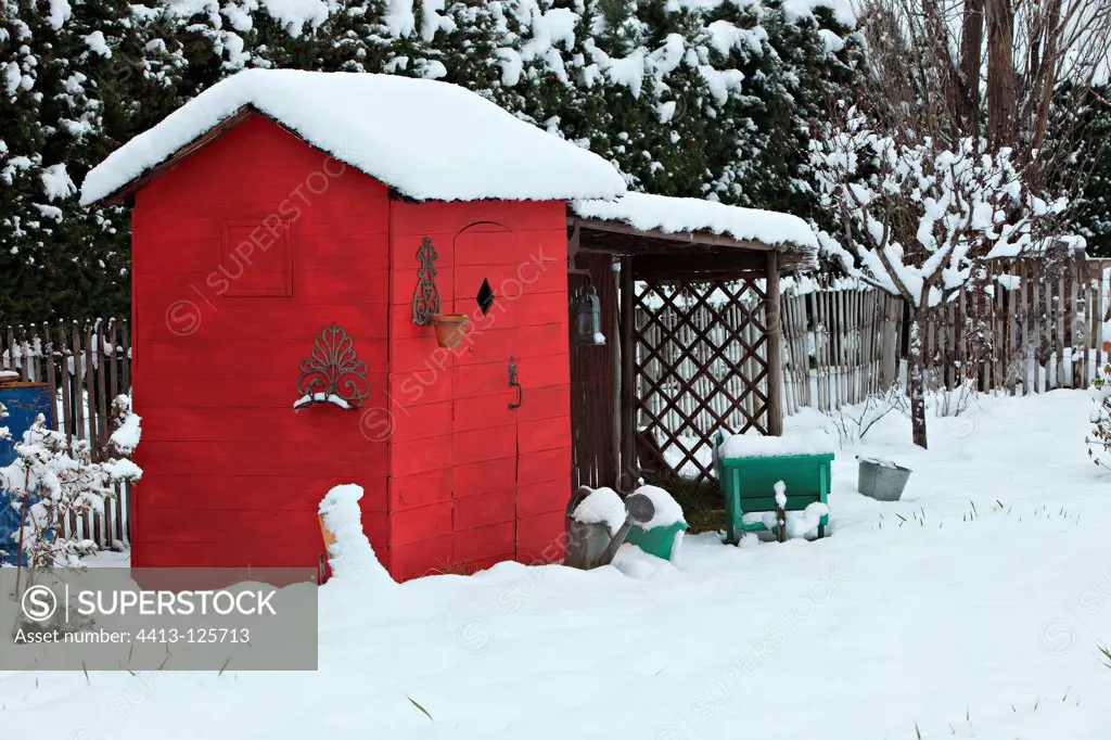 Garden shed under snow in Provence France