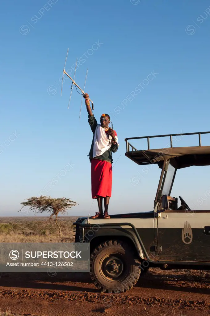 Samburu guide searching for Lions with electronic tracking