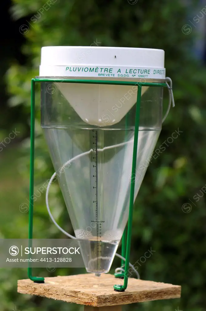 Direct-reading rain gauge installed in a garden France