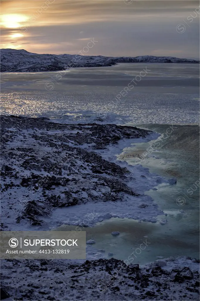 Shore and sea ice of Frobisher Bay on Baffin Island Canada
