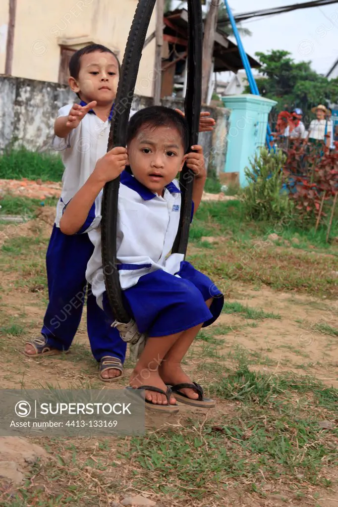 Children playing in the courtyard of the kindergarten Burma