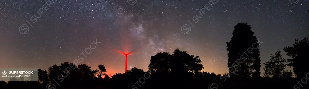 Constellations over a wind turbine