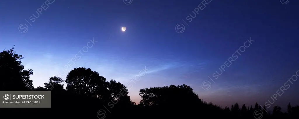 The Moon and the Pleiades with noctilucent clouds