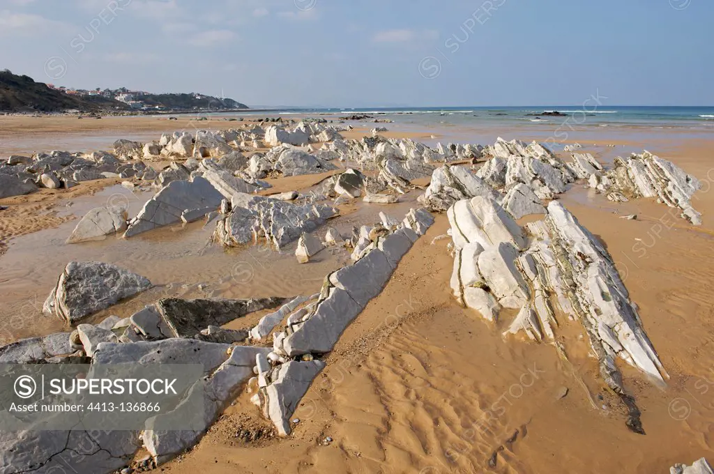 Standing on the white limestone sand Cote Basque France