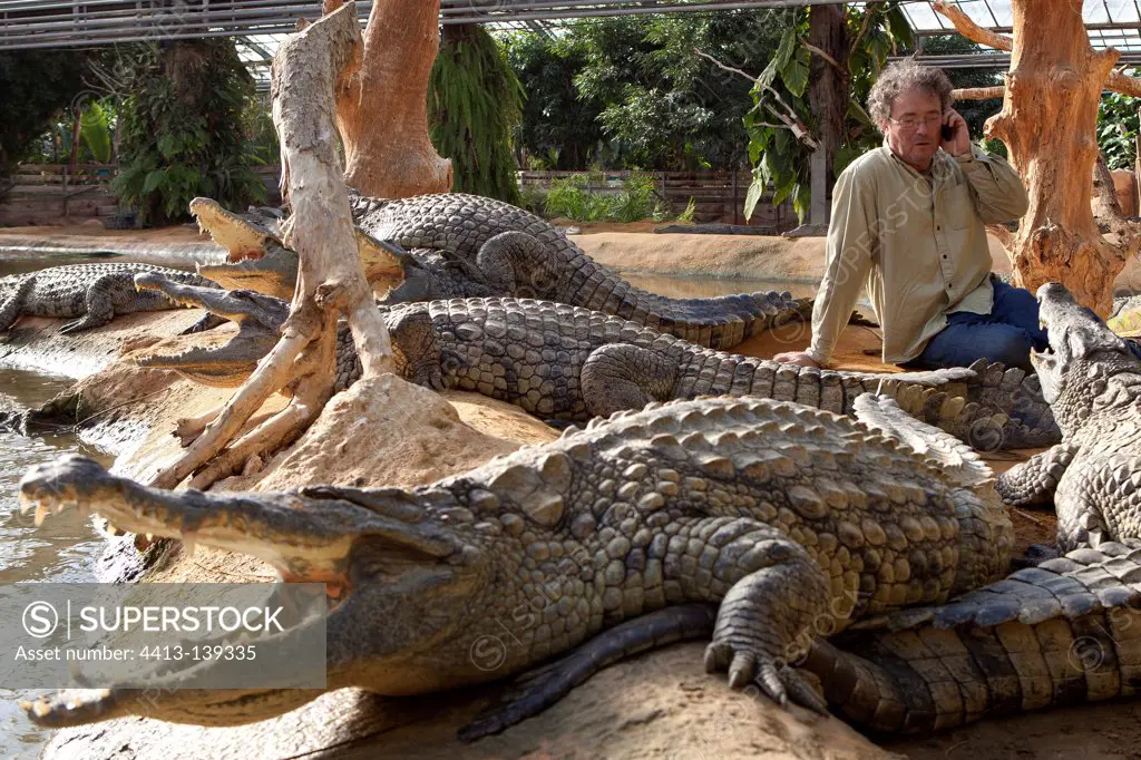 Luc Fougerolle calling in the middle of Nile Crocodiles