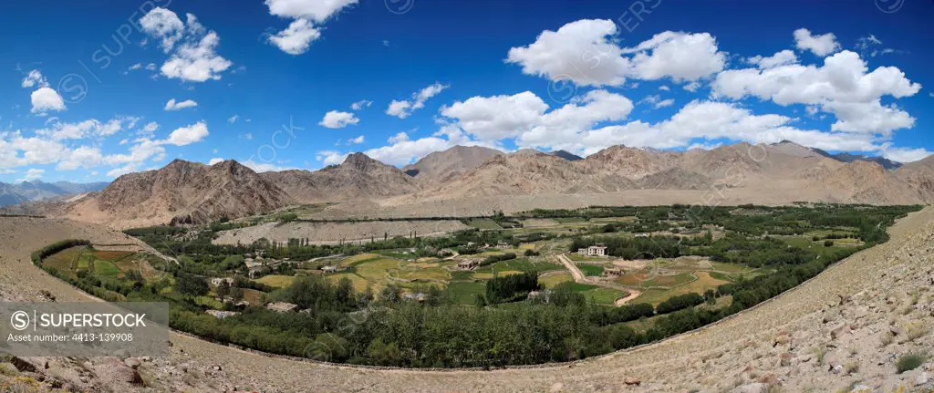 Arid mountains and fertile valley Leh Ladakh Himalayas India