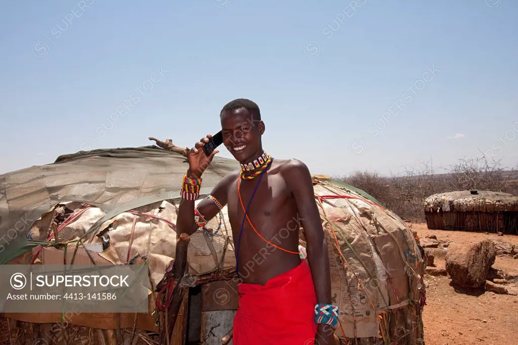 Samburu man with mobile phone Samburu NR Kenya