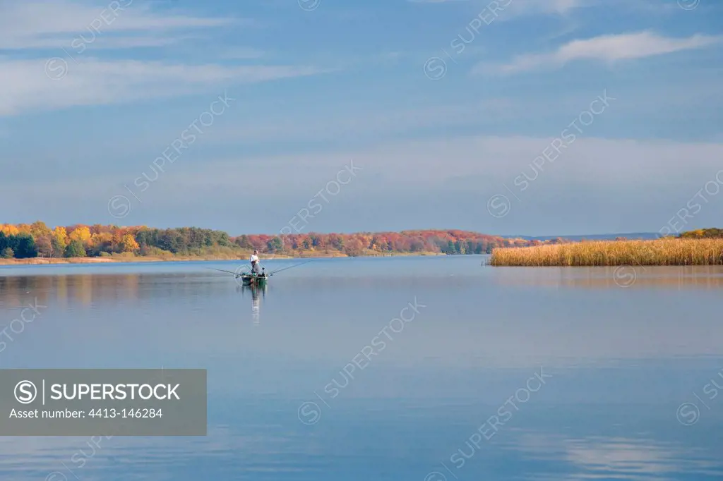 Zander fishing in boat in the fall Lorraine France