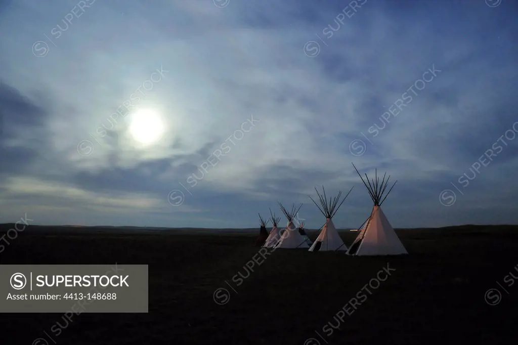 Indian teepees in the moonlight for guest houses
