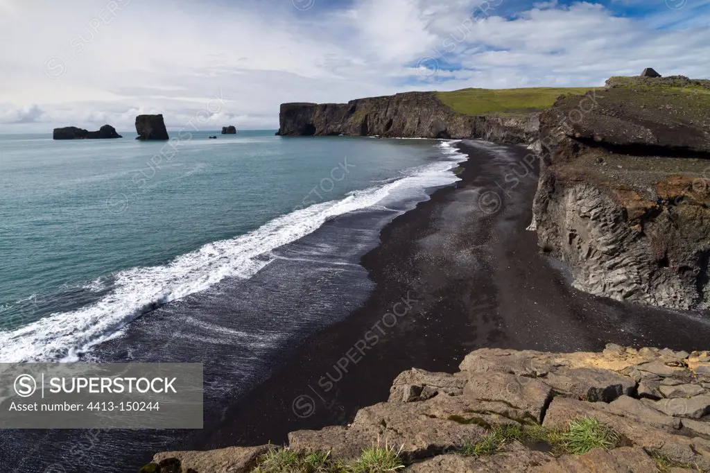 Cliffs and black sand beach of Dyrhólaey Iceland