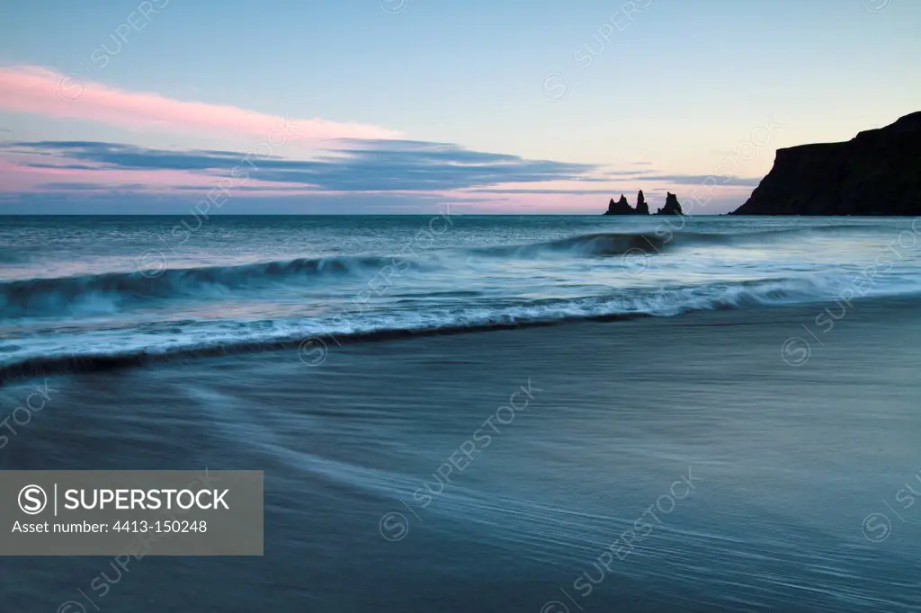 Black sand beach of Vik and rocks ReynisdrangarIceland