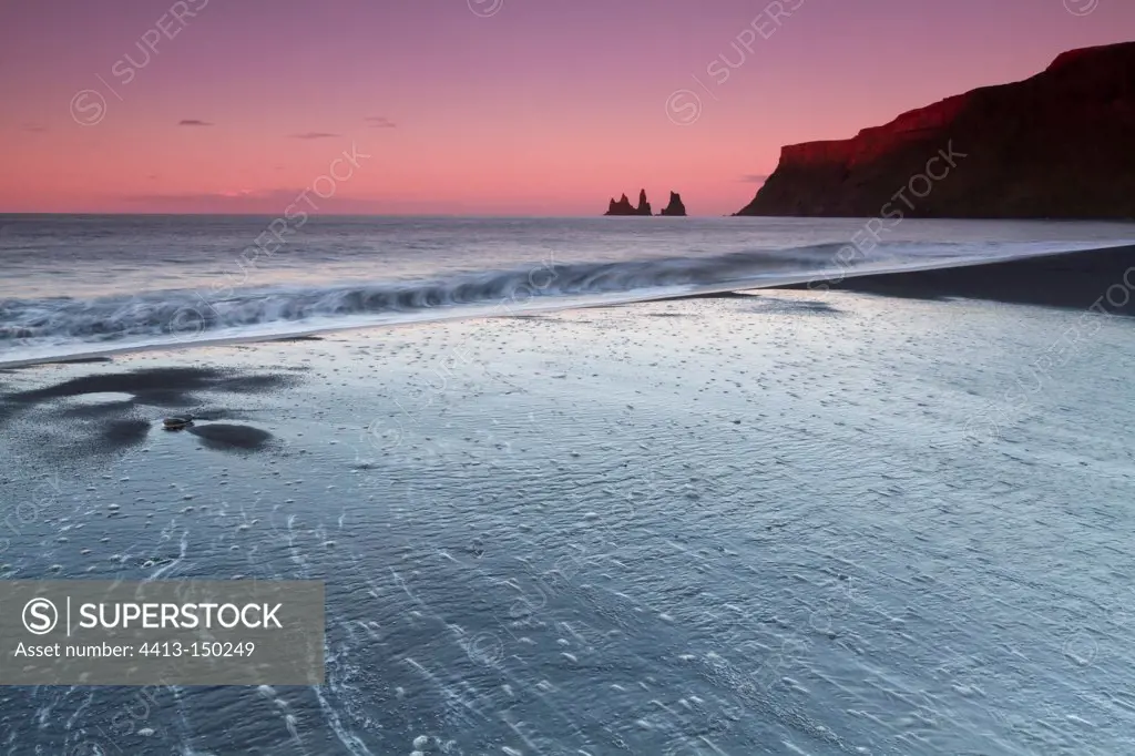 Black sand beach of Vik and rocks ReynisdrangarIceland