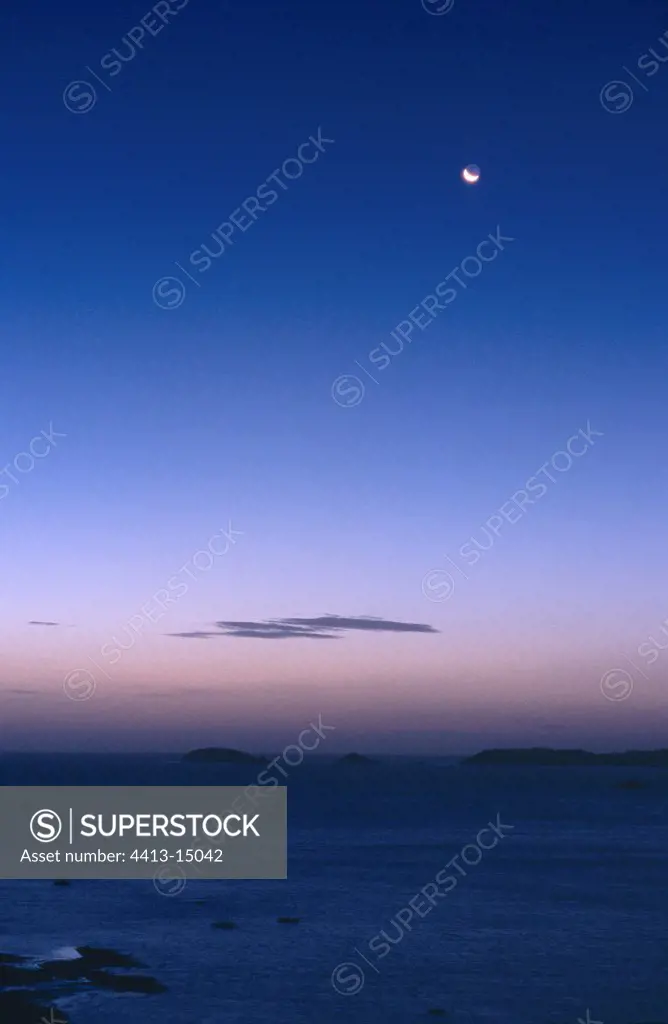 Crescent of Moon on Paimpol Bay Brittany France