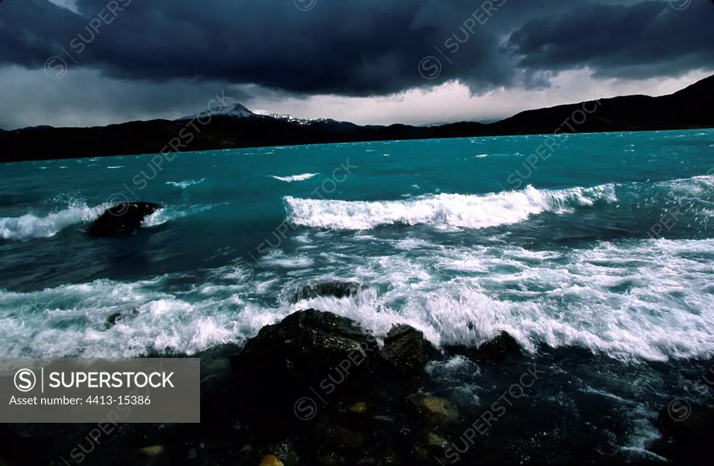 Shore of Lago Pehoe under stormy sky Chile