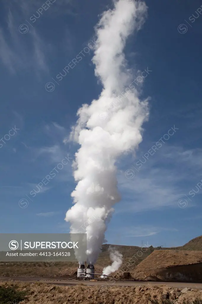 Steam plumes rising from vents geothermal development