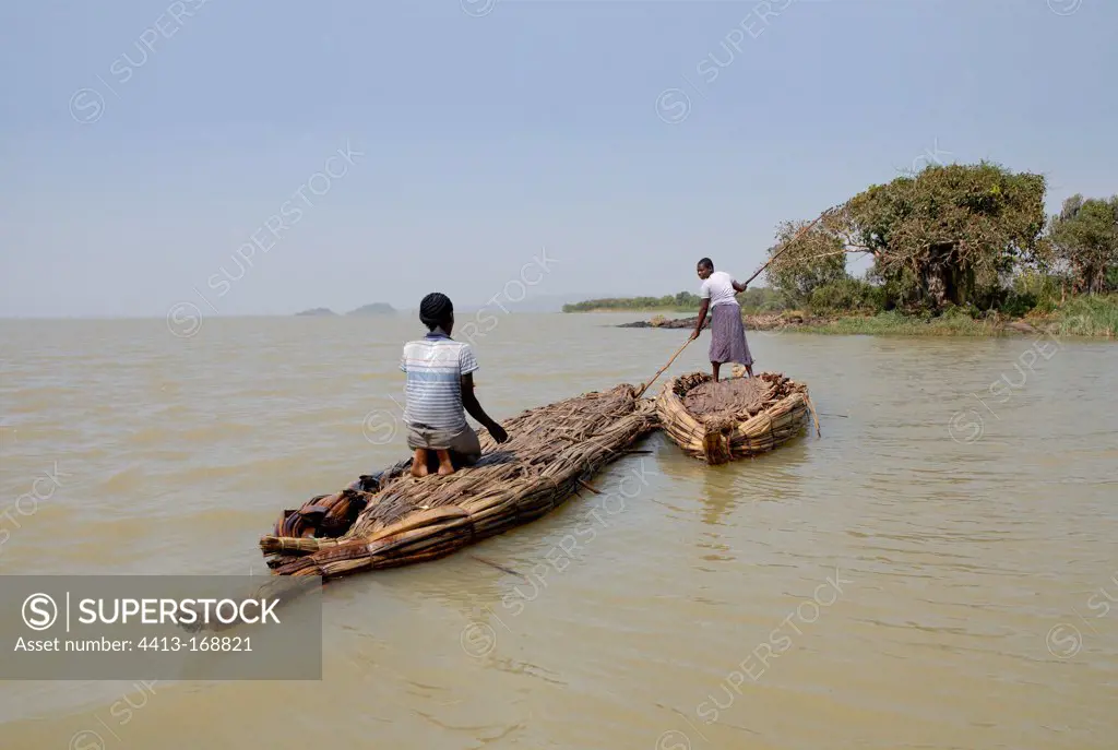 Women in papyrus boats on Lake Tana Ethiopia