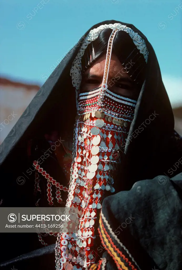 Bedouin woman wearing tradional wedding veil Sinai mountains