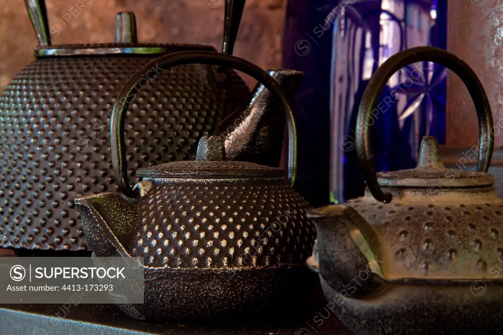 Teapots collection on a shelf