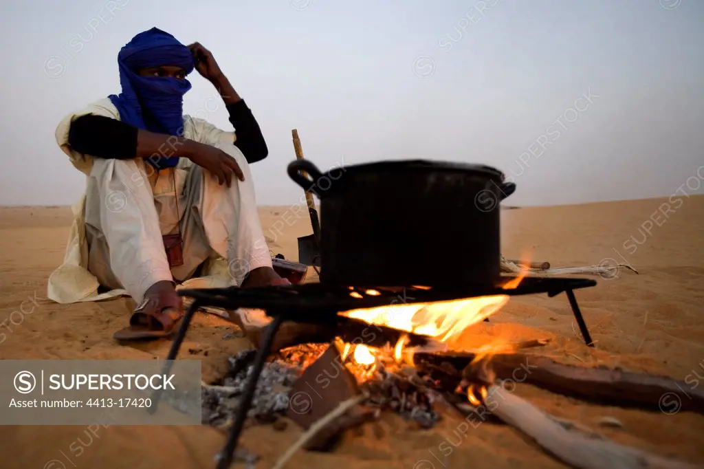 Tuareg in front of a fire Desert of Tenere Niger