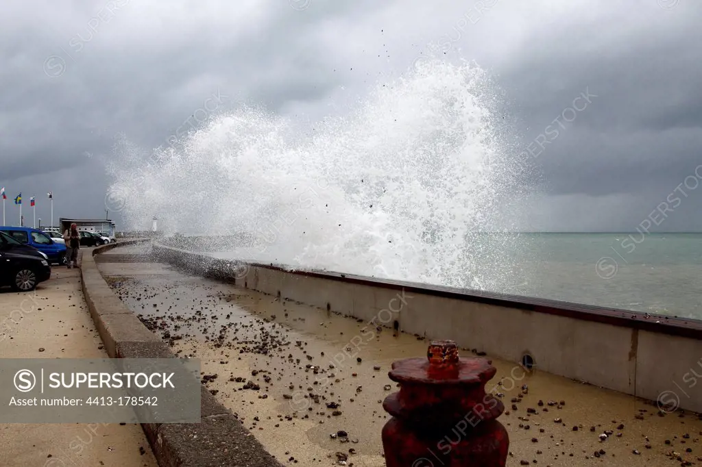 Waves against a sea wall at St. Valery en Caux France
