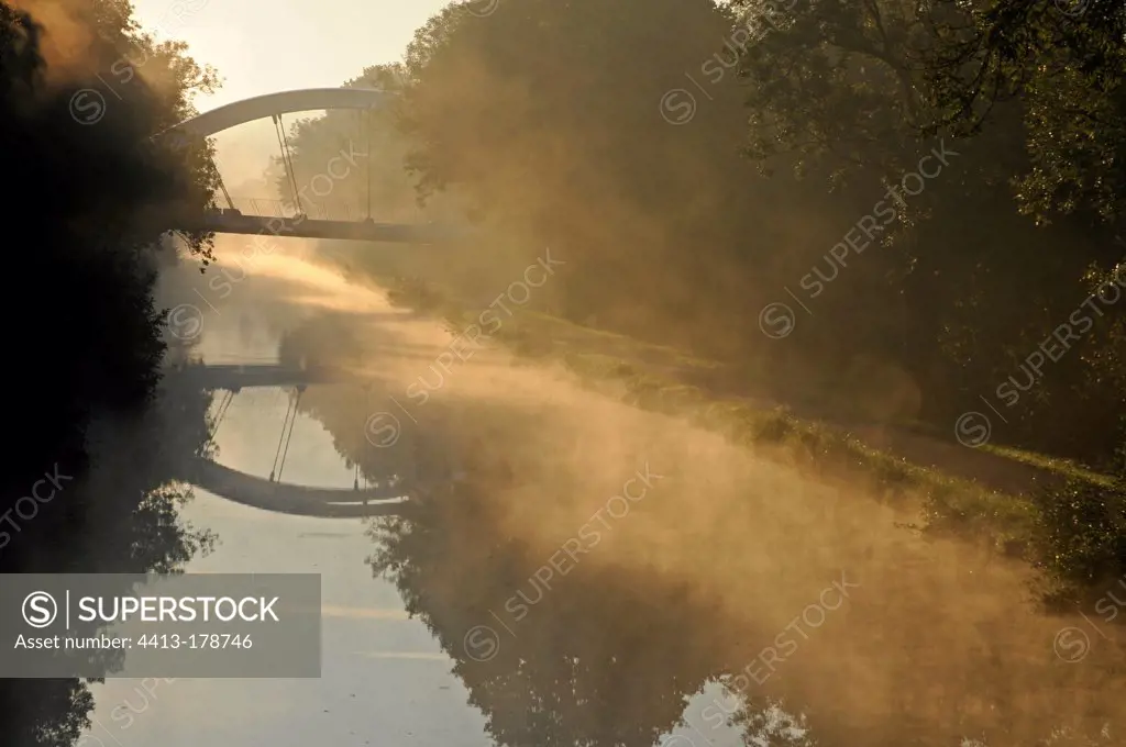 Mist at sunrise on the channel Haute-SaoneFrance