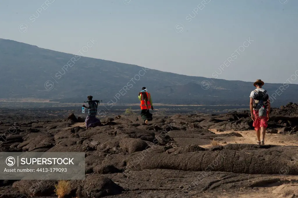 Tourists supervised by militia down a volcano Ethiopia