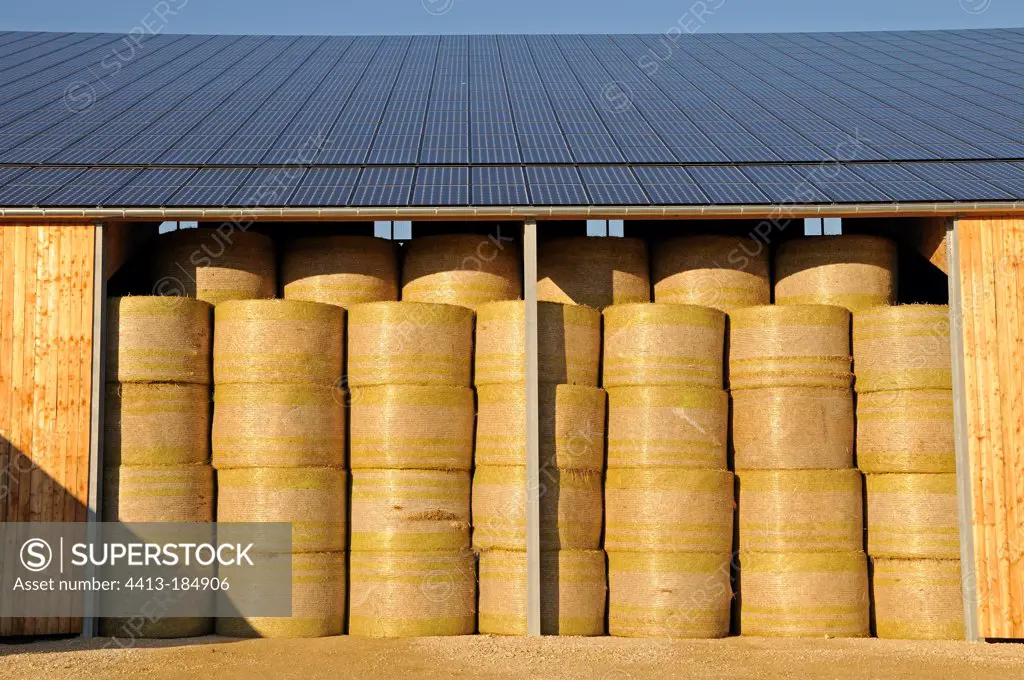 Bales of straw in farm covered with solar panelsFrance