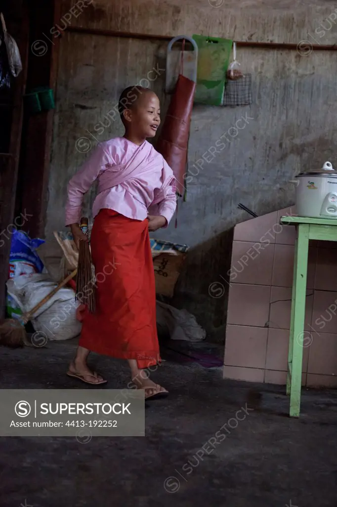 Nun cooking dinner Nyaung Shwe in Burma