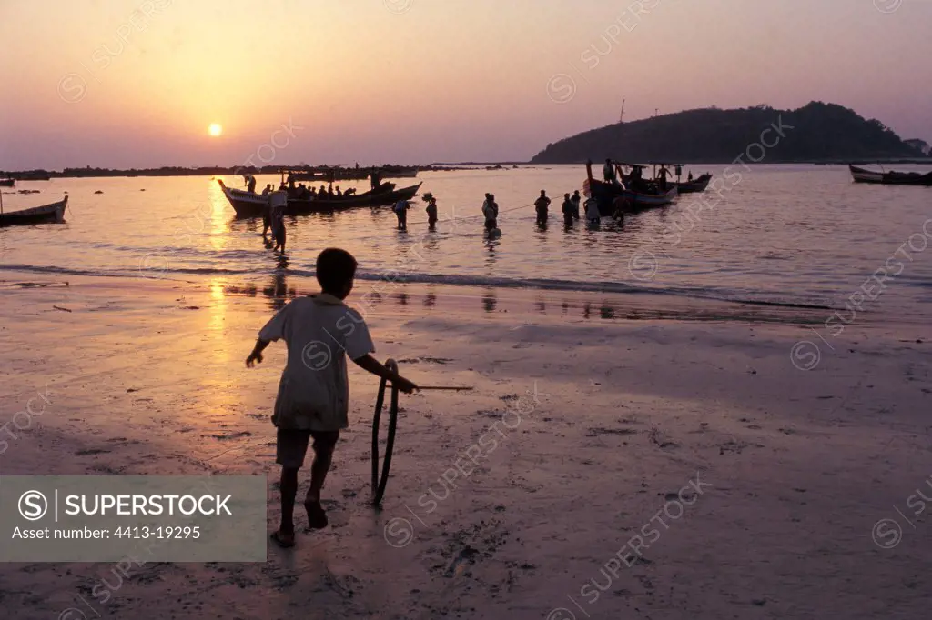 Child exploiting a beach of the West coast of Burma