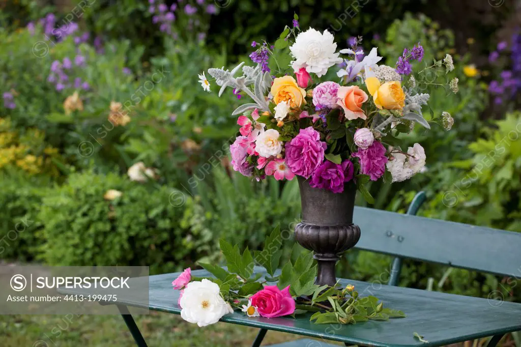 Flowers bouquet on a garden terrace
