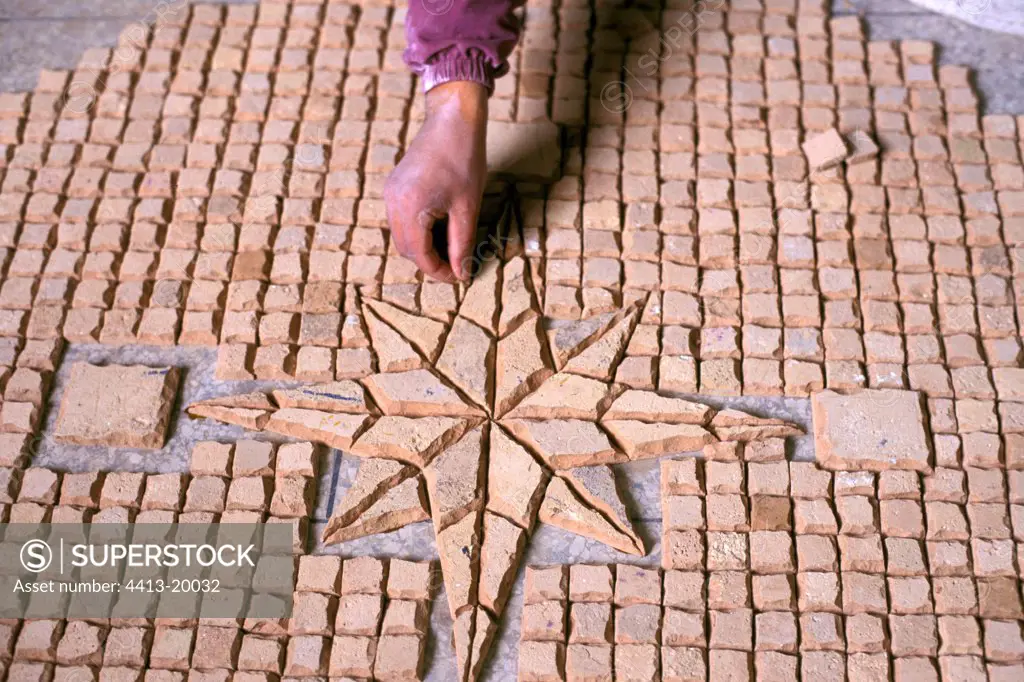 Construction of a mosaic in Zeliges with Fes in Morocco