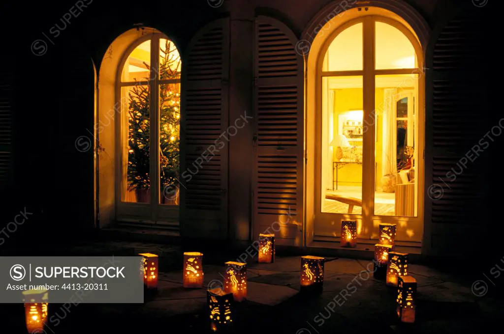 Lanterns lit on the terrace of a house France