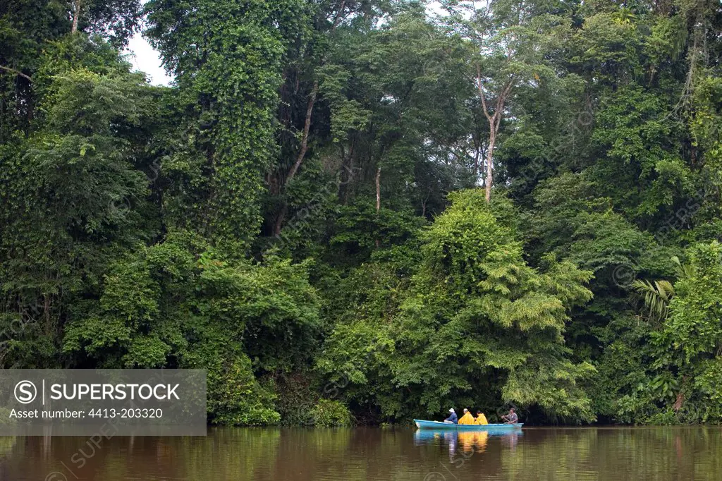 Tourists in small boat visiting the Tortuguero National Park
