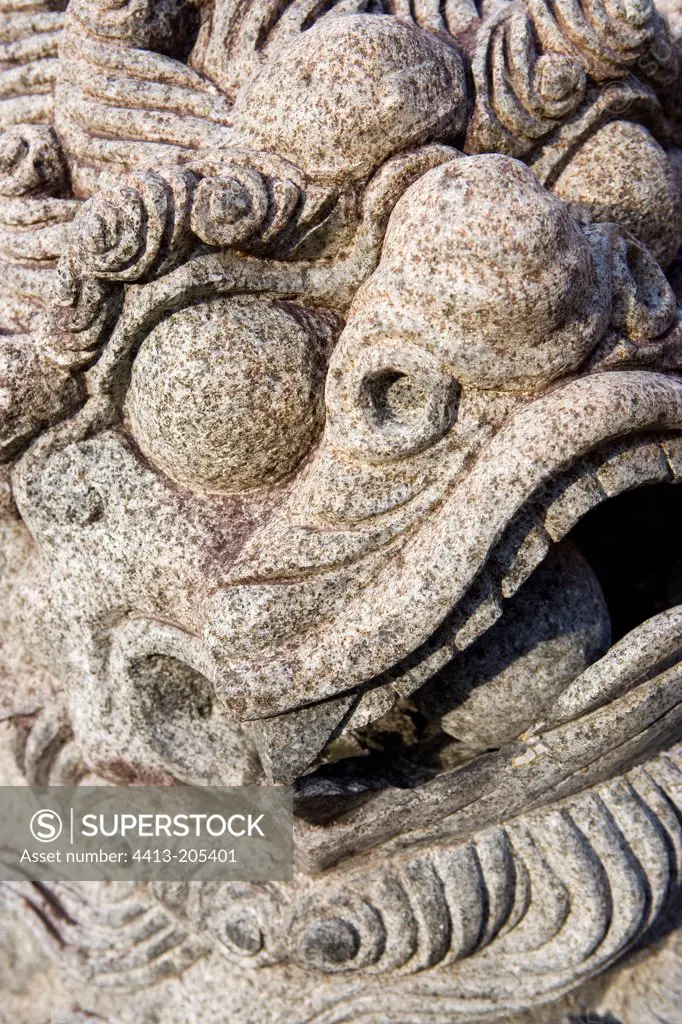 Detail of a stone carved Chinese Dragon Singapore