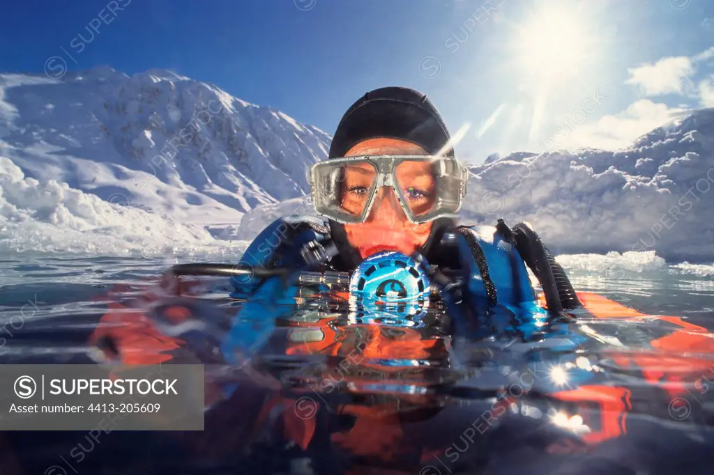 Diving under ice Alps Europe